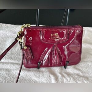 Coach Y2K Burgundy Patent Leather Wristlet (callout: color transfer) GUC